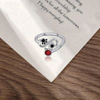Adjustable Ring with Black Paw Prints & Red Gemstone