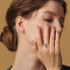 Adjustable Ring with Black Paw Prints & Red Gemstone